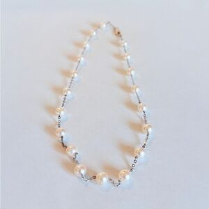 Elegant Pearl Necklace with beautiful substantial white gold chain.